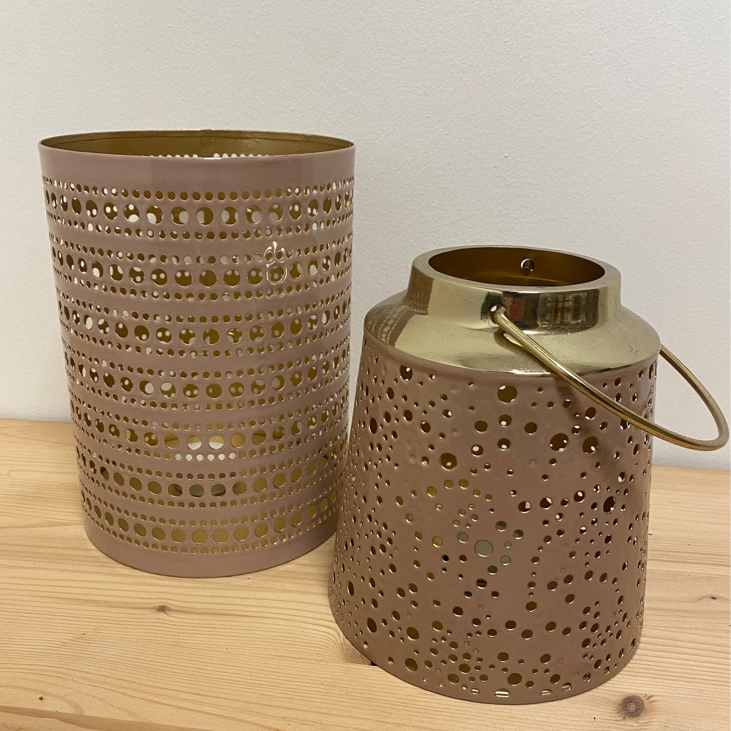 Wind licht met handvaat oud roze / goud.